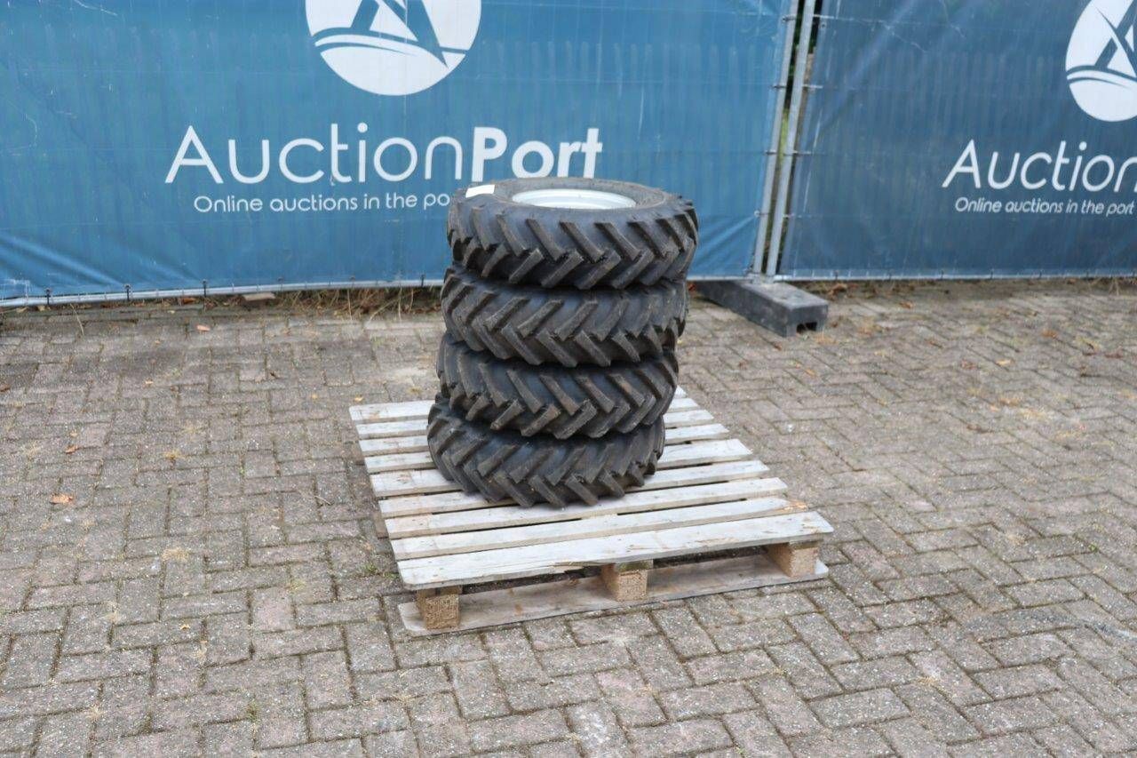 Tires BKT 7.00-12 with rim