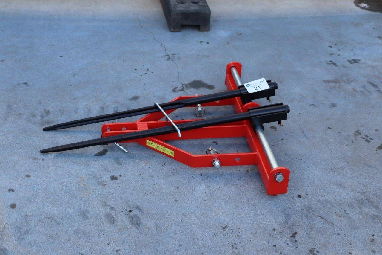 Folding bale picker
