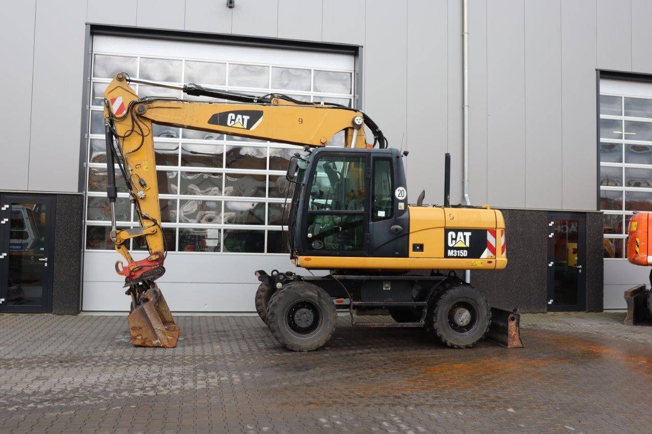 Wheel excavator Caterpillar M315D Diesel 2014
