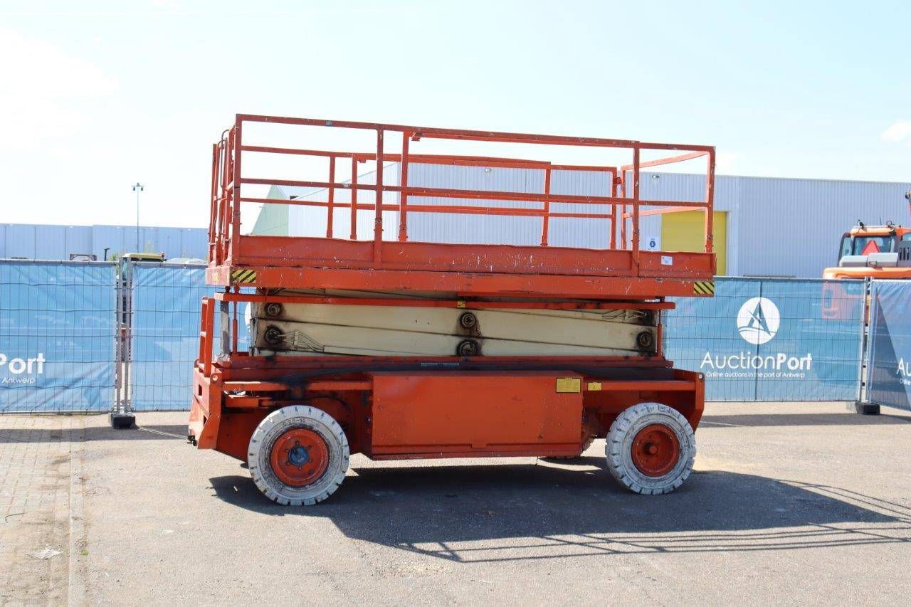 Scissor lift Holland Lift Q135EL24 Electric 500kg 15.5m 2002
