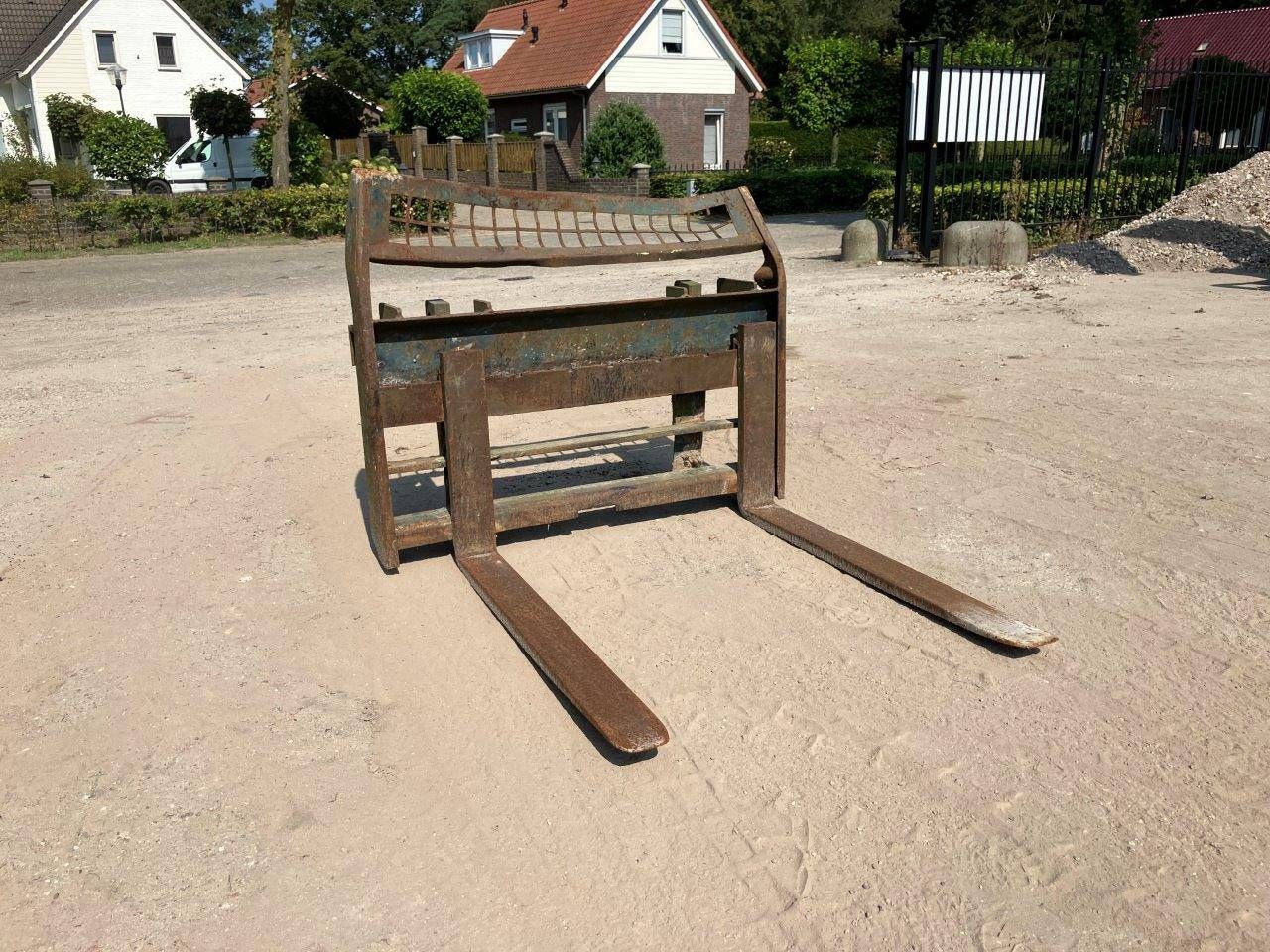 Fork carriage skid steer loader