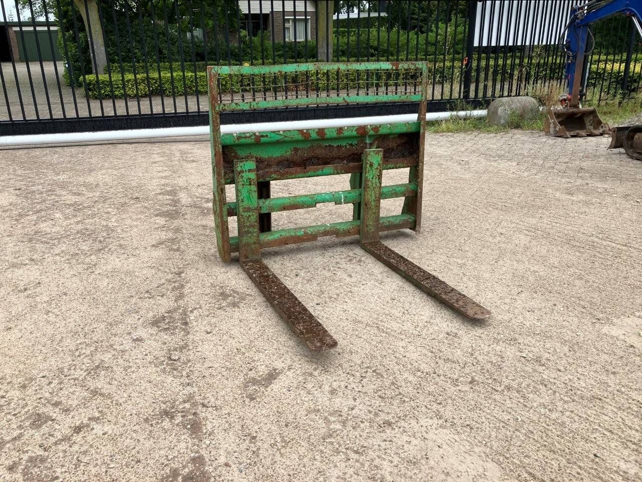 Fork carriage skid steer loader