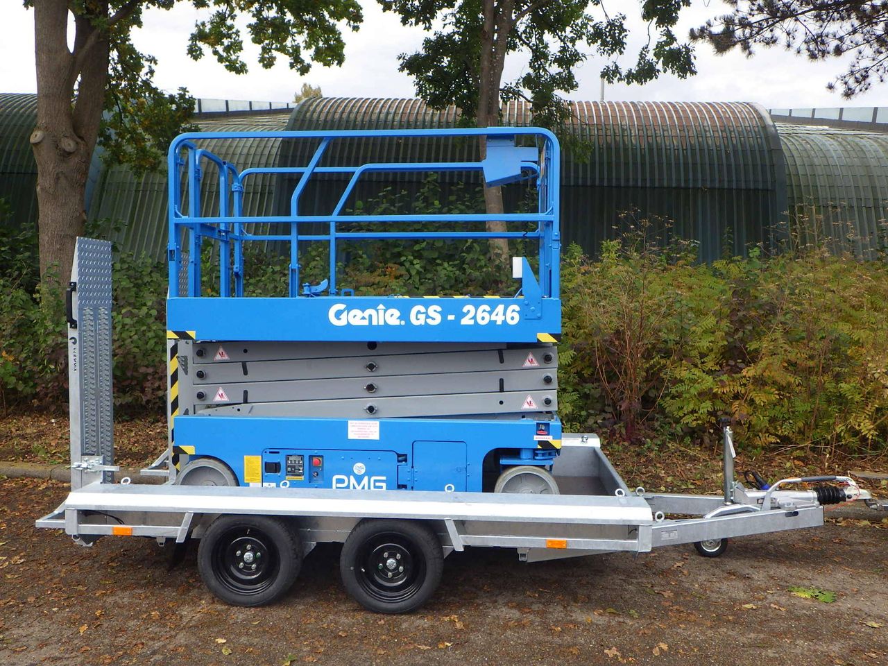 Scissor lift Genie GS-2646 Electric 9.92m 2013 with Vlemmix Trailer New