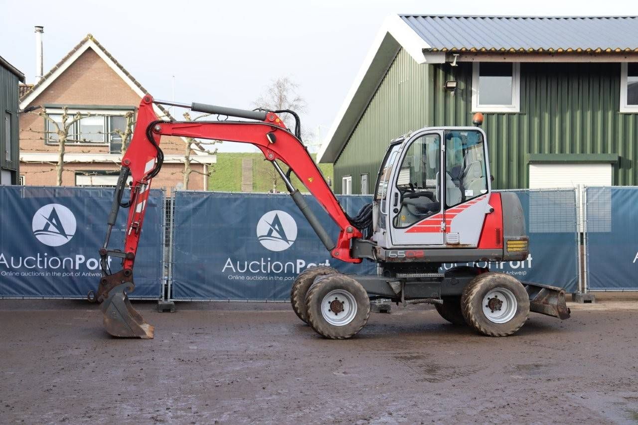 Wheeled excavator Neuson 6502 WD Diesel 2002