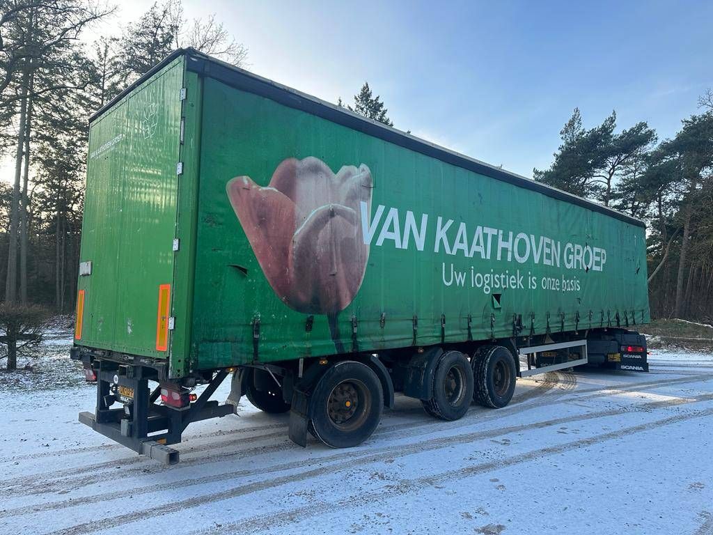 Sliding curtain semi-trailer Tracon TO3 2009