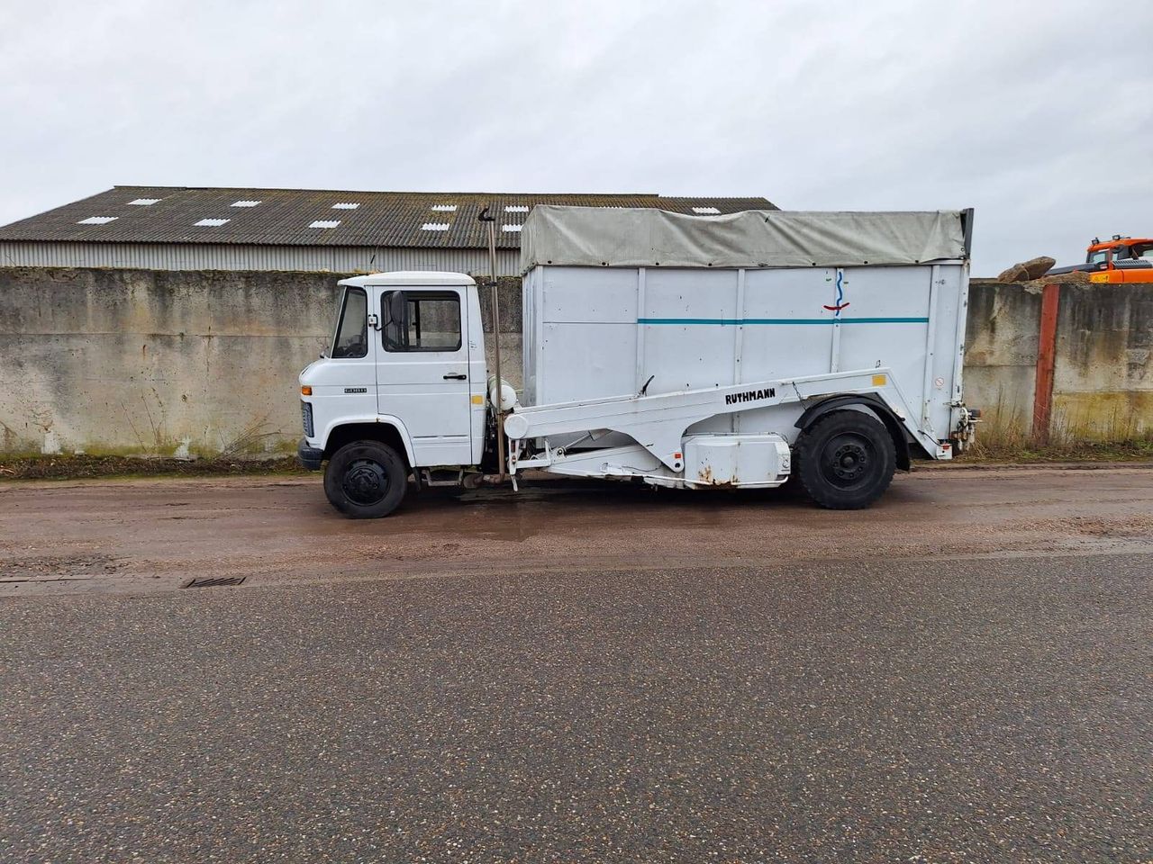 Truck Mercedes-Benz 608D Diesel with Ruthmann container system