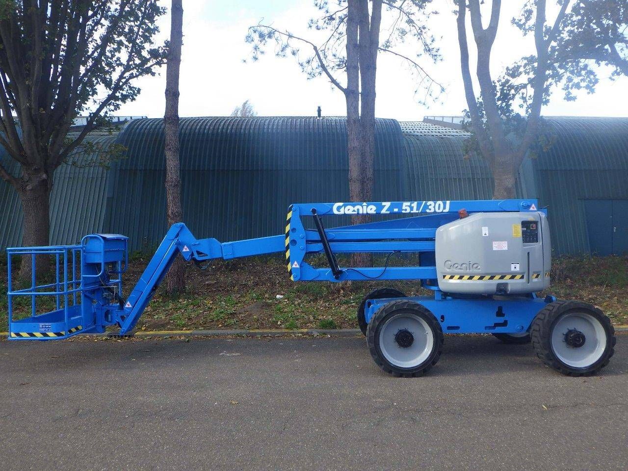 Articulating telescopic boom lift Genie Z-51/30J RT 17.59m Diesel 2007