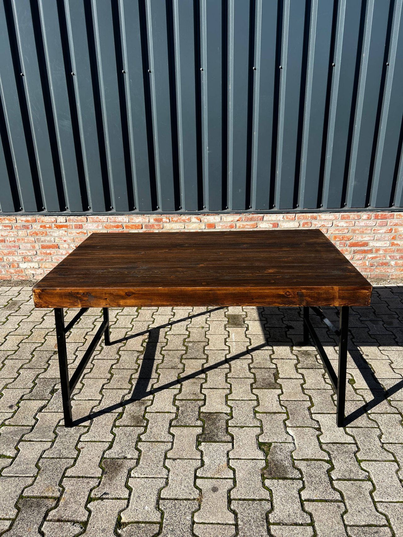 Set of small low folding wooden tables with metal base