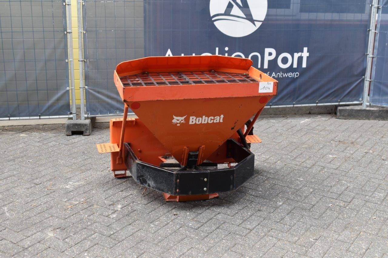 Bobcat sawdust spreader