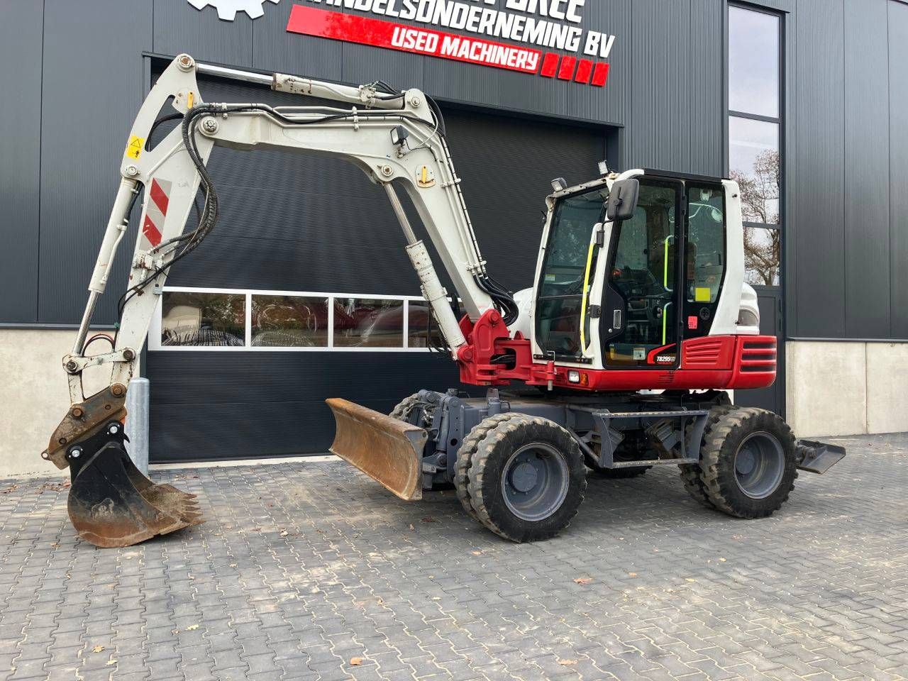 Wheel excavator Takeuchi TB295W Diesel 74kW 2014