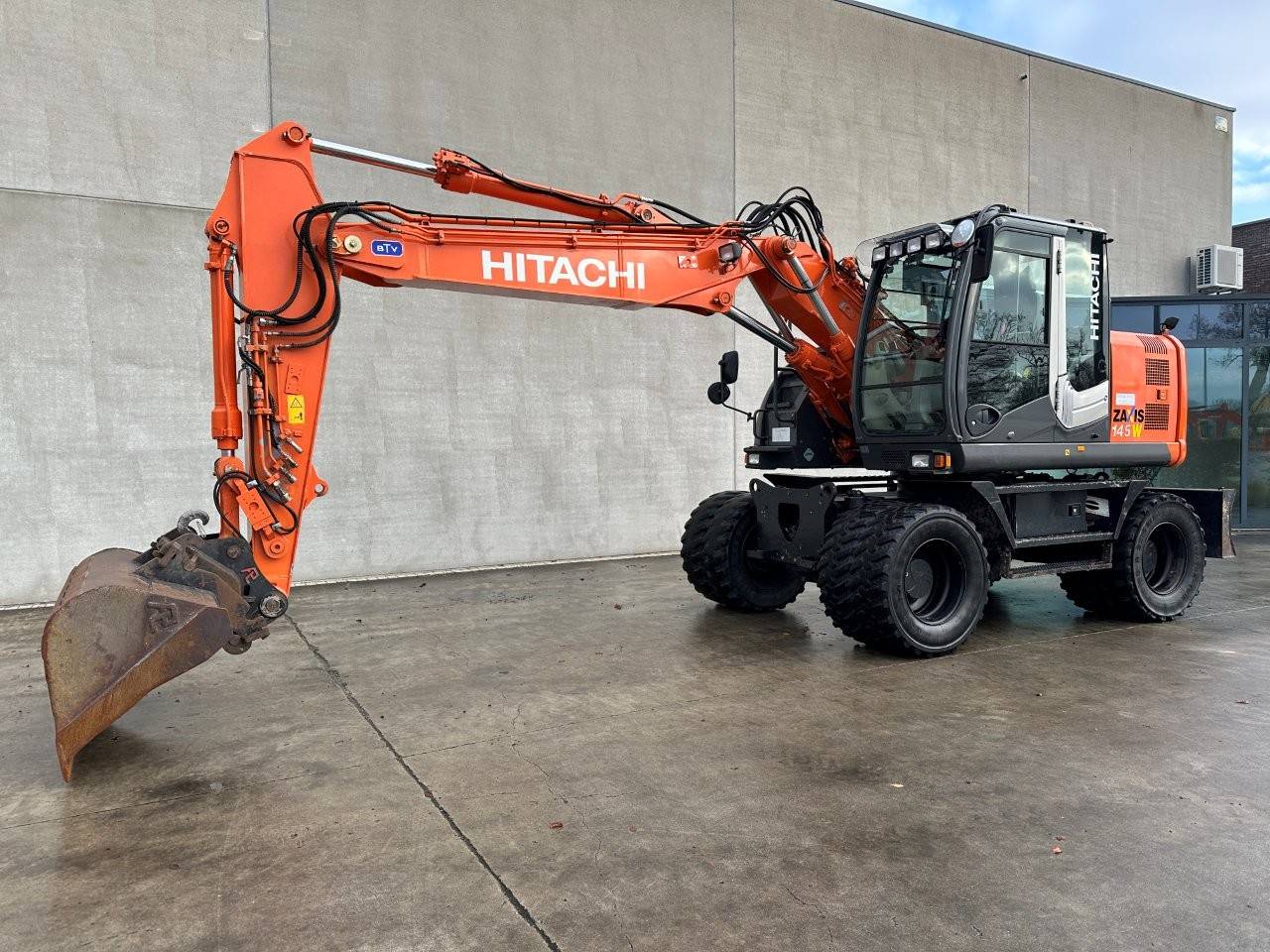 Wheel excavator Hitachi ZX145W-3 Diesel 2012